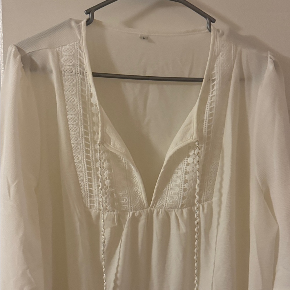 Elegant White Blouse with Lace Details